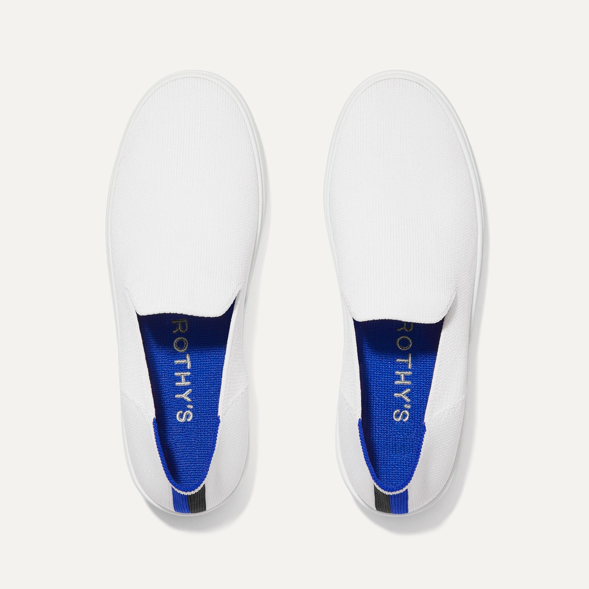 A pair of The slip-on Sneaker in Bright White shown from the top view.
