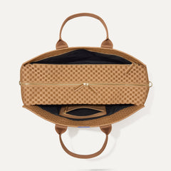 The Weekender in Hazelnut shown from the top with zipper side compartment and magnetic side compartment open.