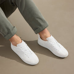 hover | Model wearing The RS01 Sneaker in White.