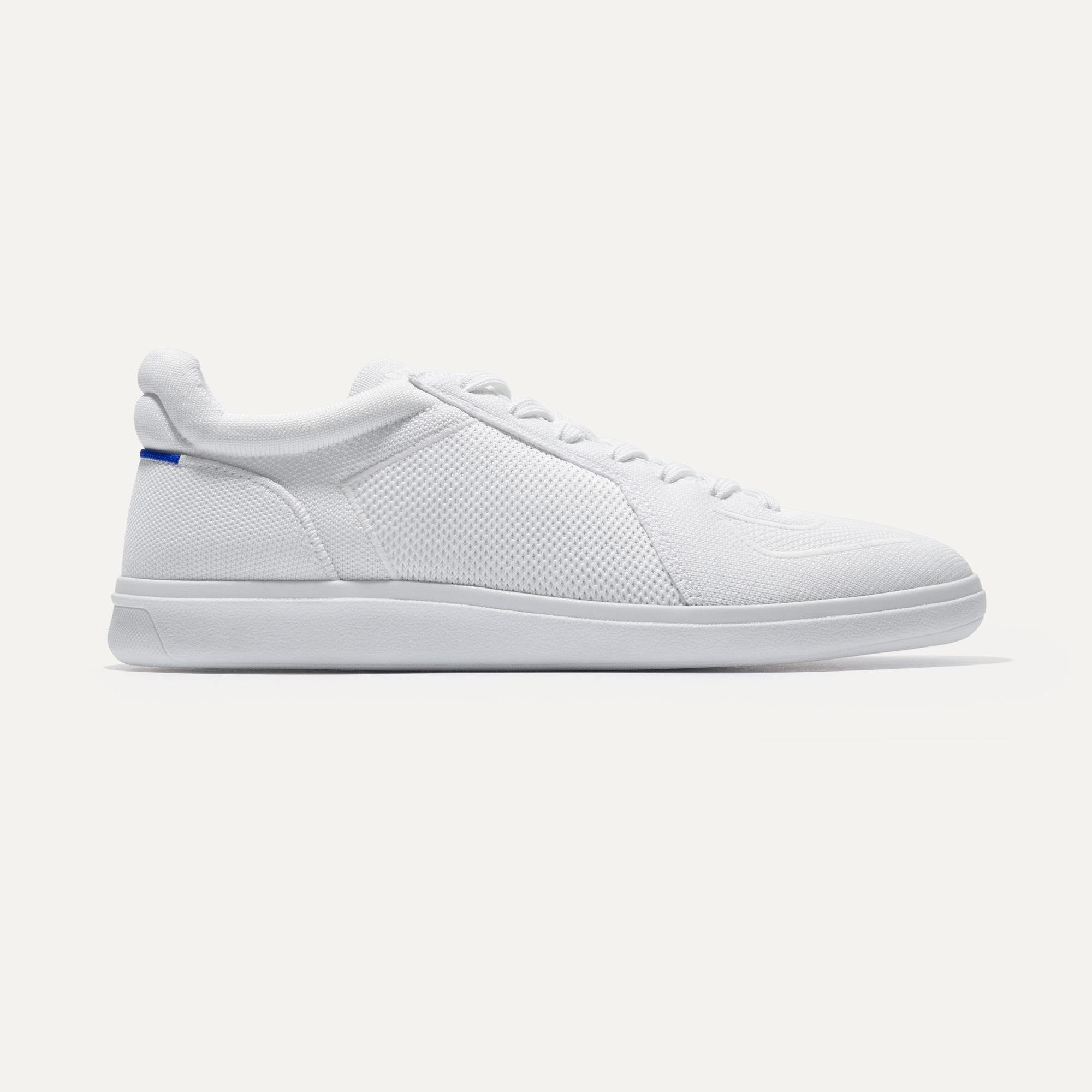 The RS01 Sneaker in White shown from the side.
