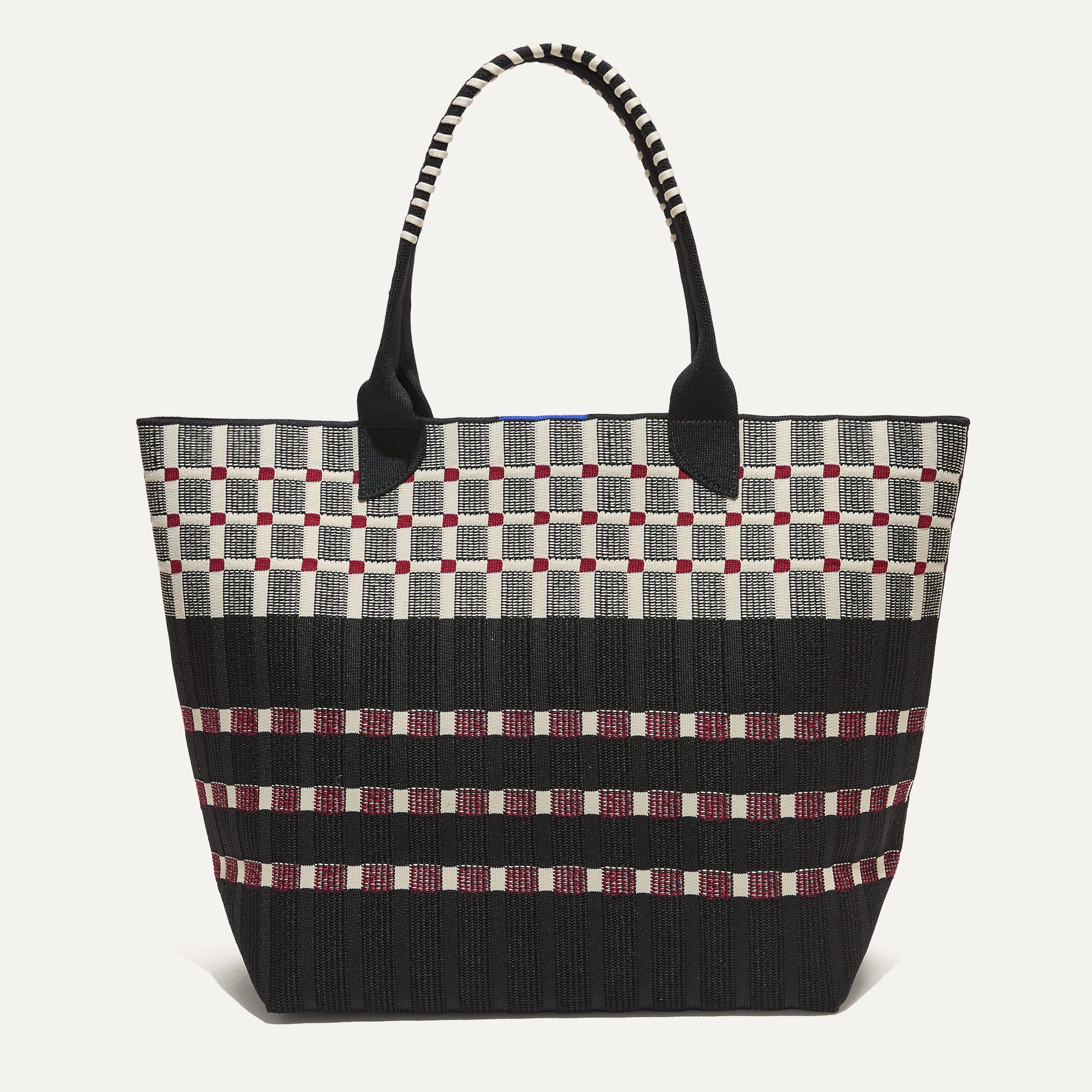 PLP |The Lightweight Tote in Newspaper shown from the front.