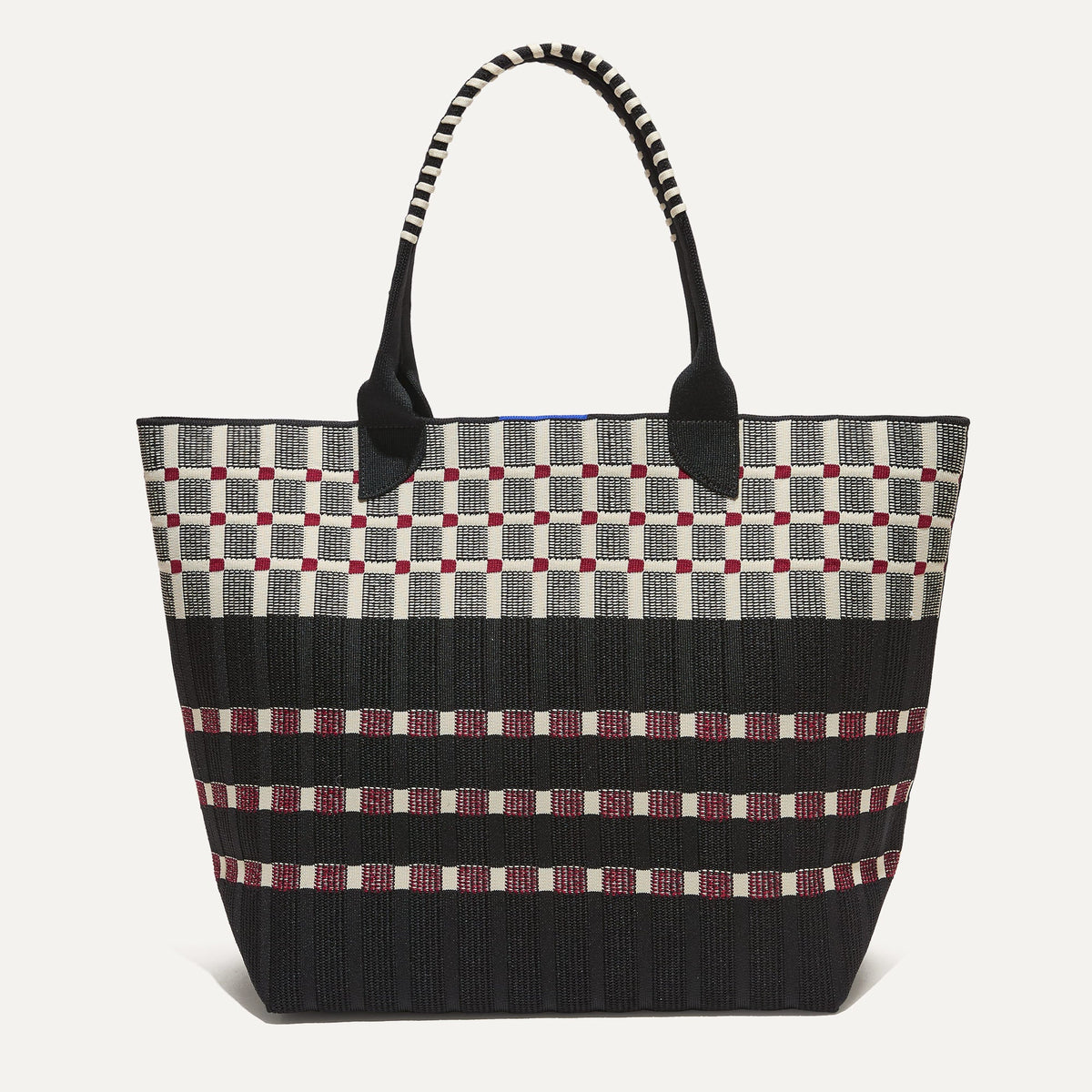 PLP |The Lightweight Tote in Newspaper shown from the front.