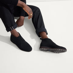 hover | Model wearing The Chukka Boot in Black.