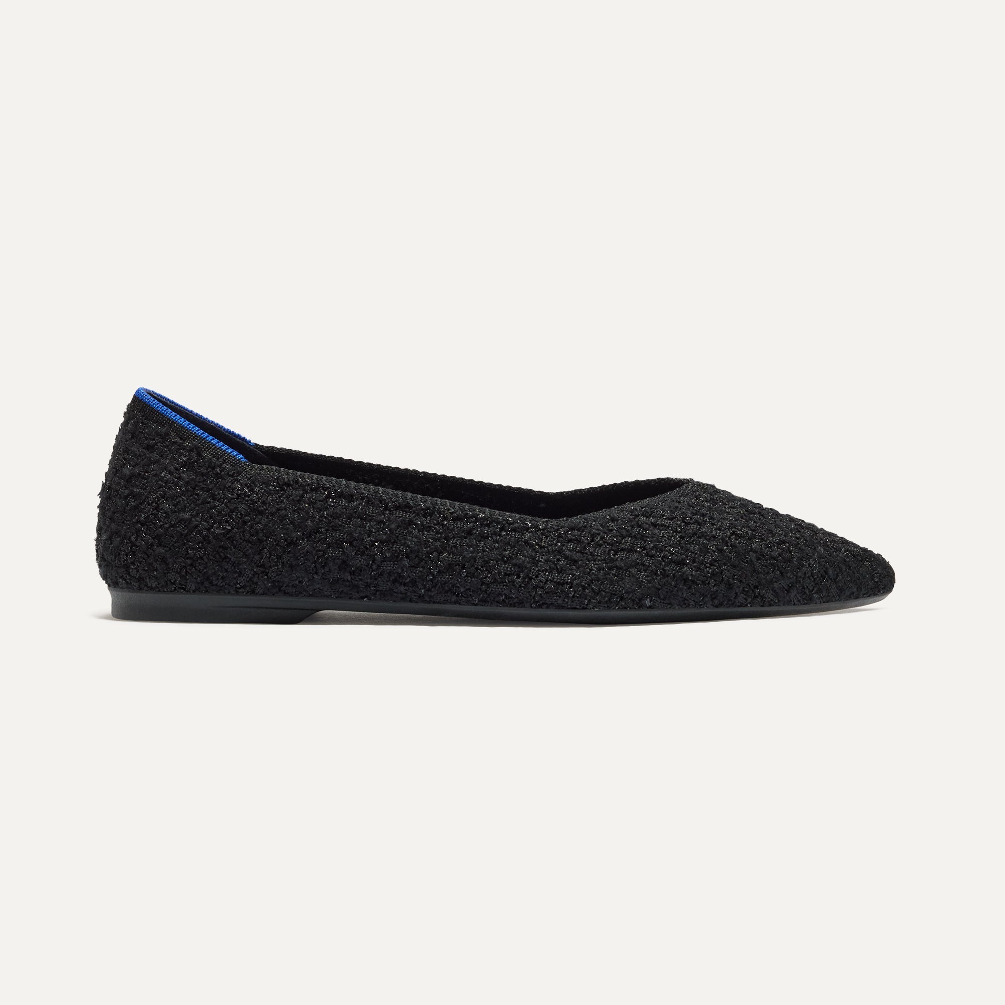 The Point II in Black Bouclé shown from the side.