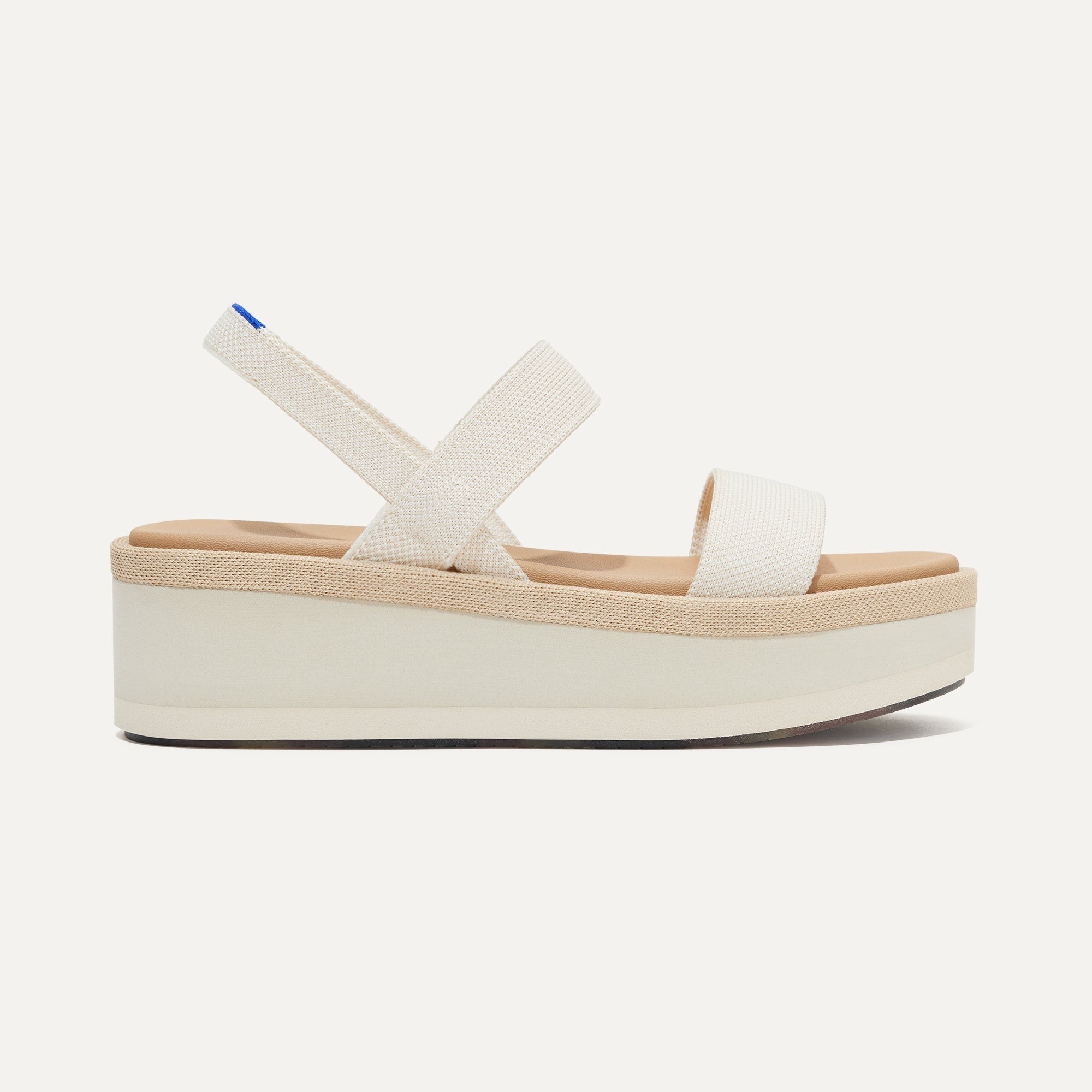 The Lightweight Wedge Sandal in Salt shown from the side.