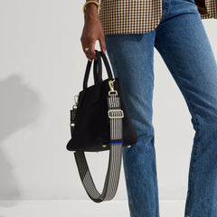 hover | Model wearing The Crossbody Strap in Salt and Pepper paired with The Classic Handbag.