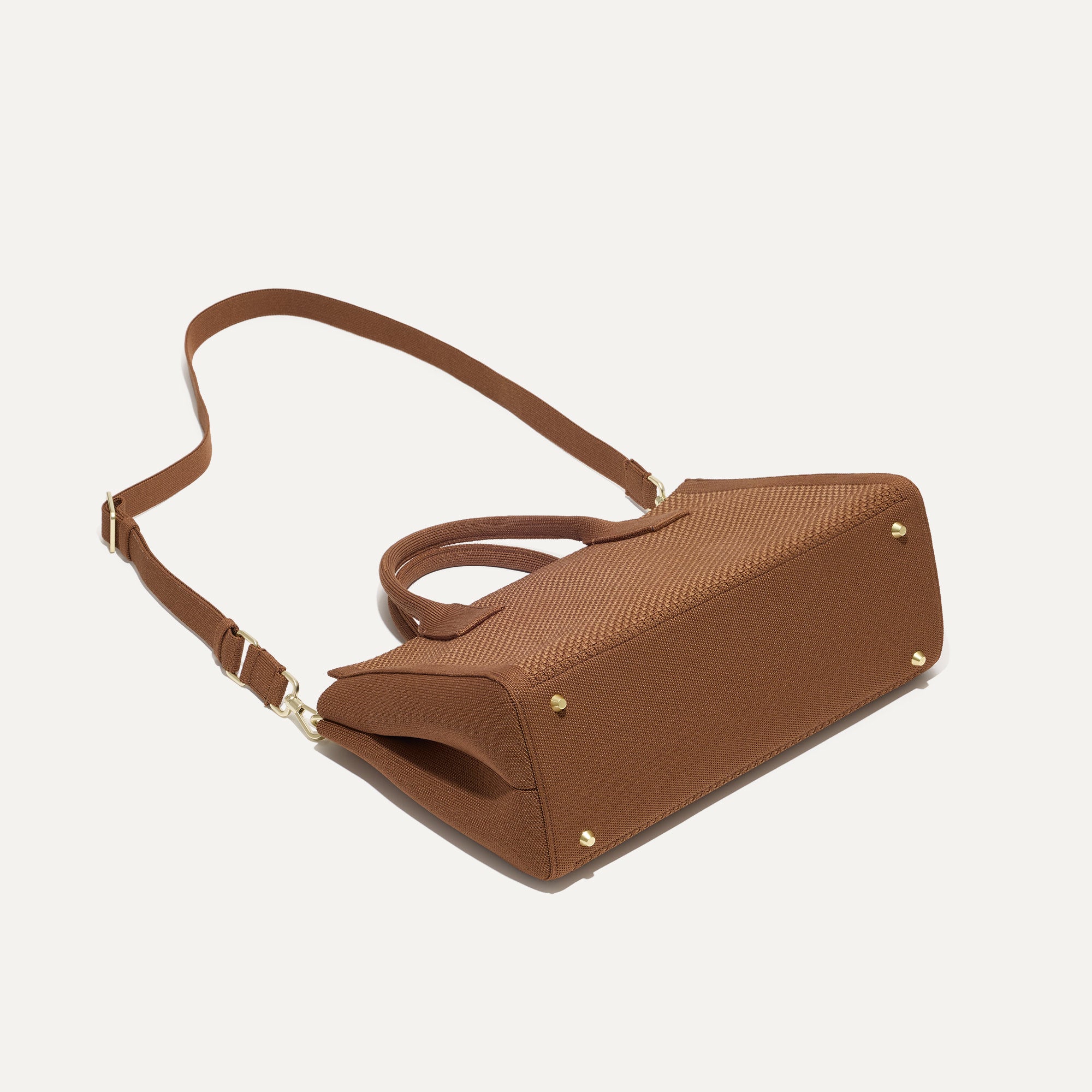 The Classic Handbag in Sierra Brown shown laid down.