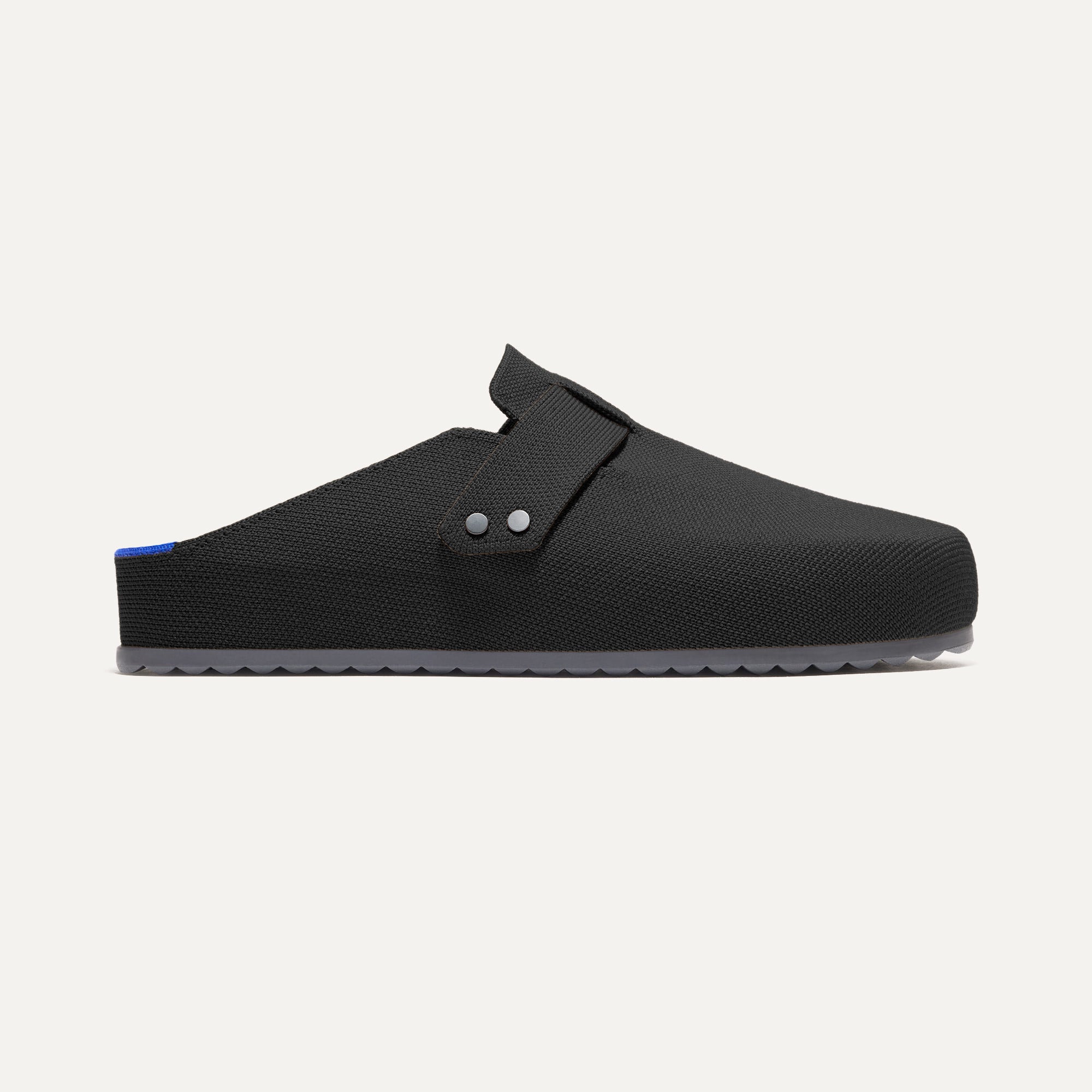 The Men's Clog in Soft Black shown from the side.