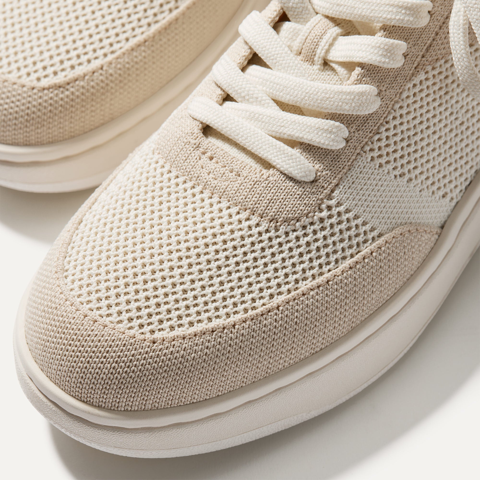 Close up of the laces of The Court Sneaker in Sand Dune.