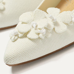 Close up of the toe and vamp of The Petal Point II in White.