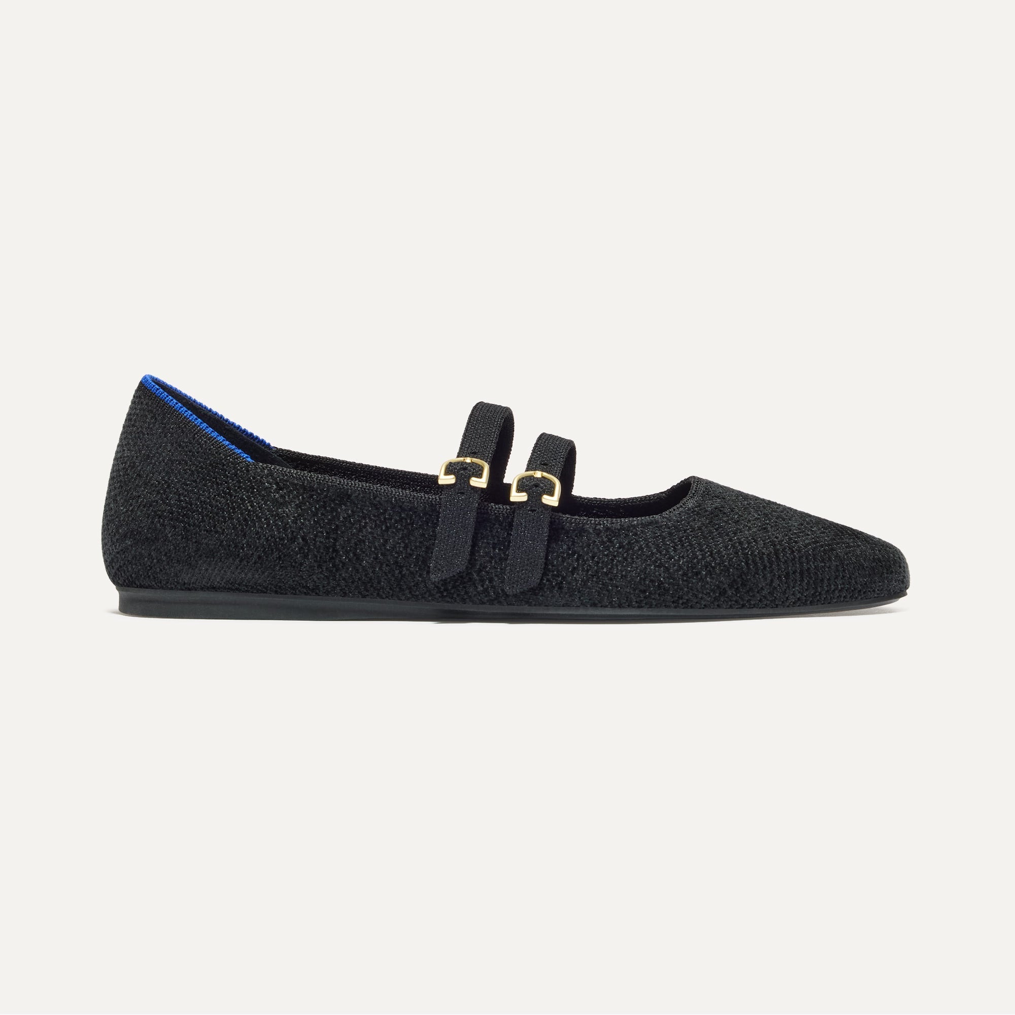 The Double Buckle Mary Jane in ReVelvet™ Black shown from the side.