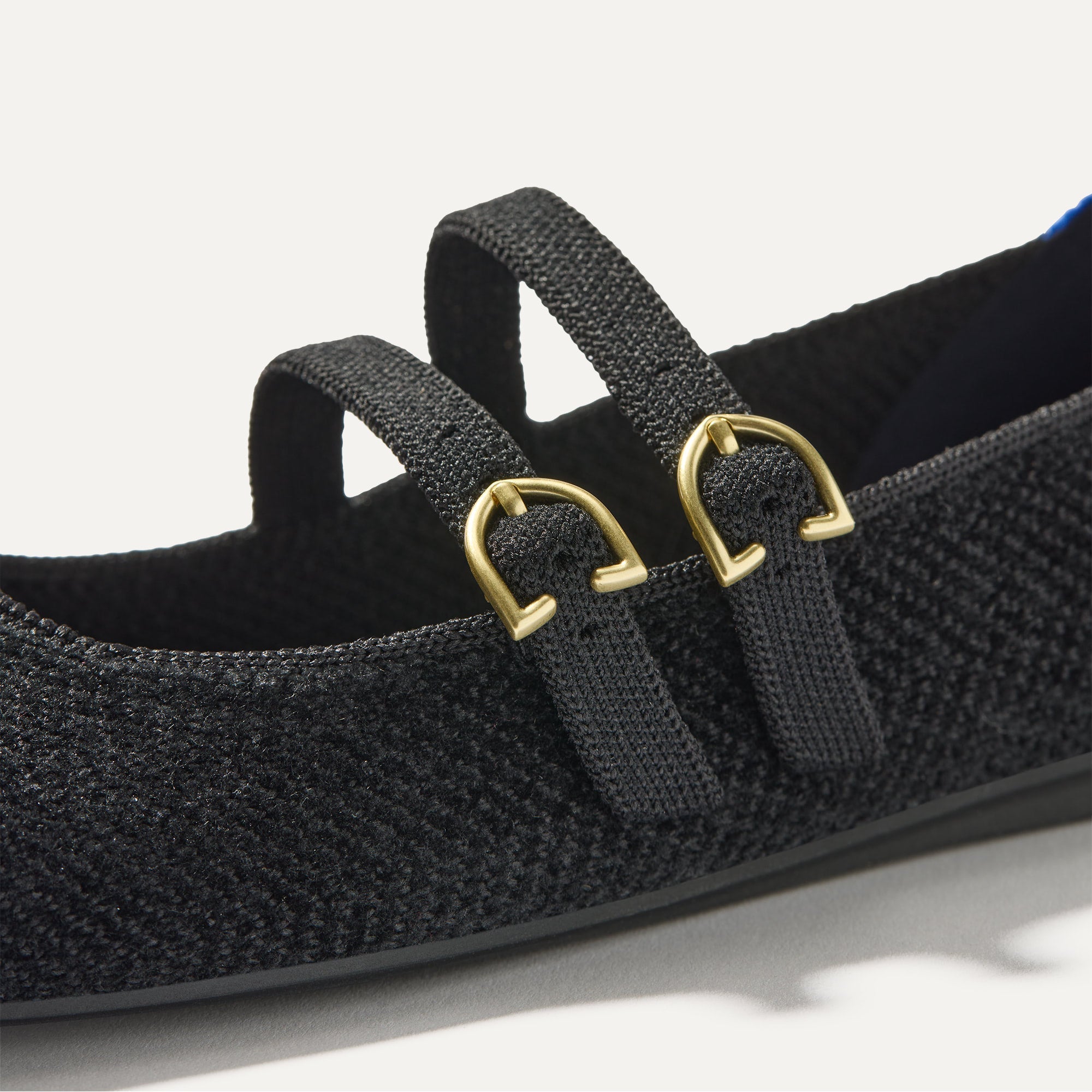 Close up of the buckle details of The Double Buckle Mary Jane in ReVelvet™ Black.