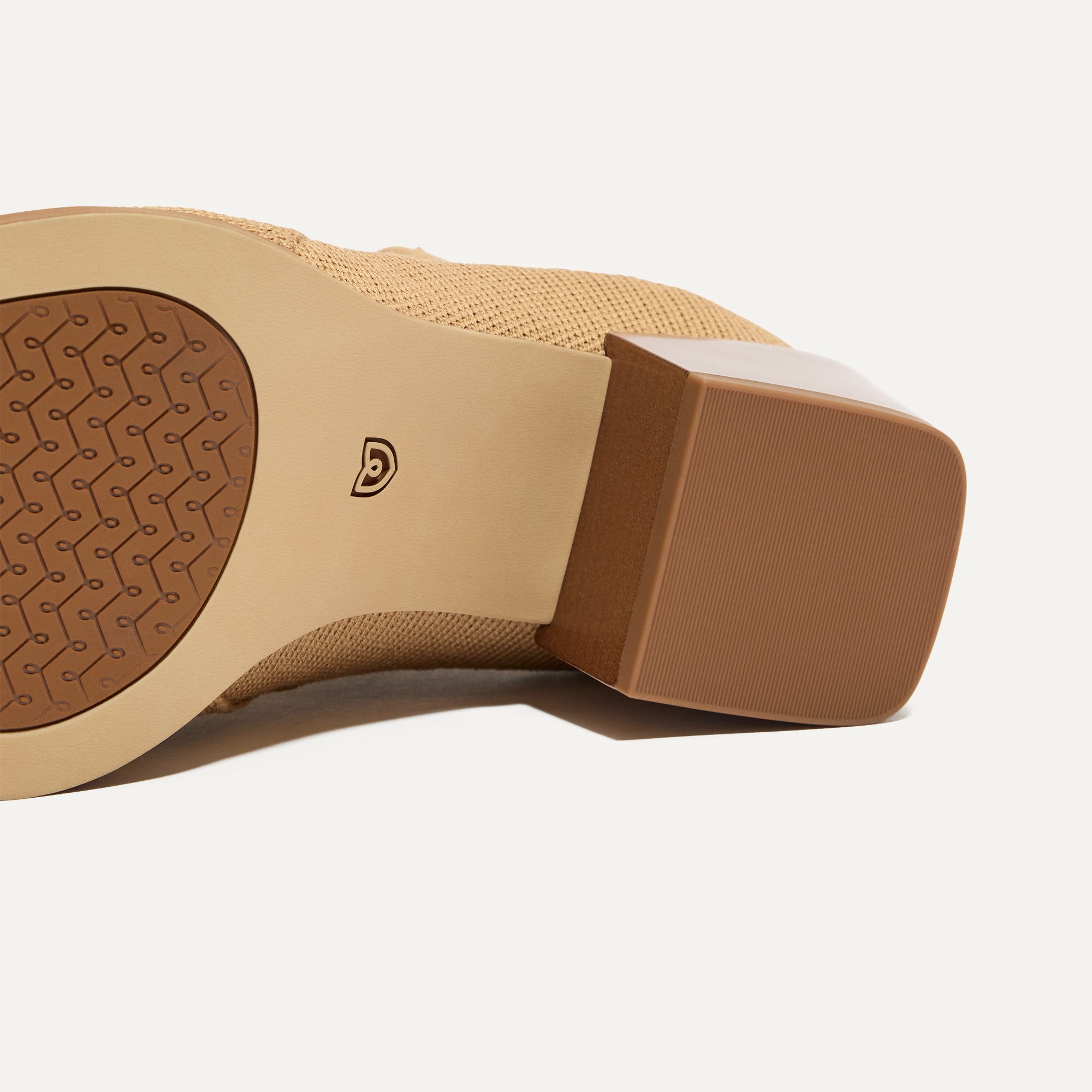 Close up of the outsoles of The Western Bootie in Wren.