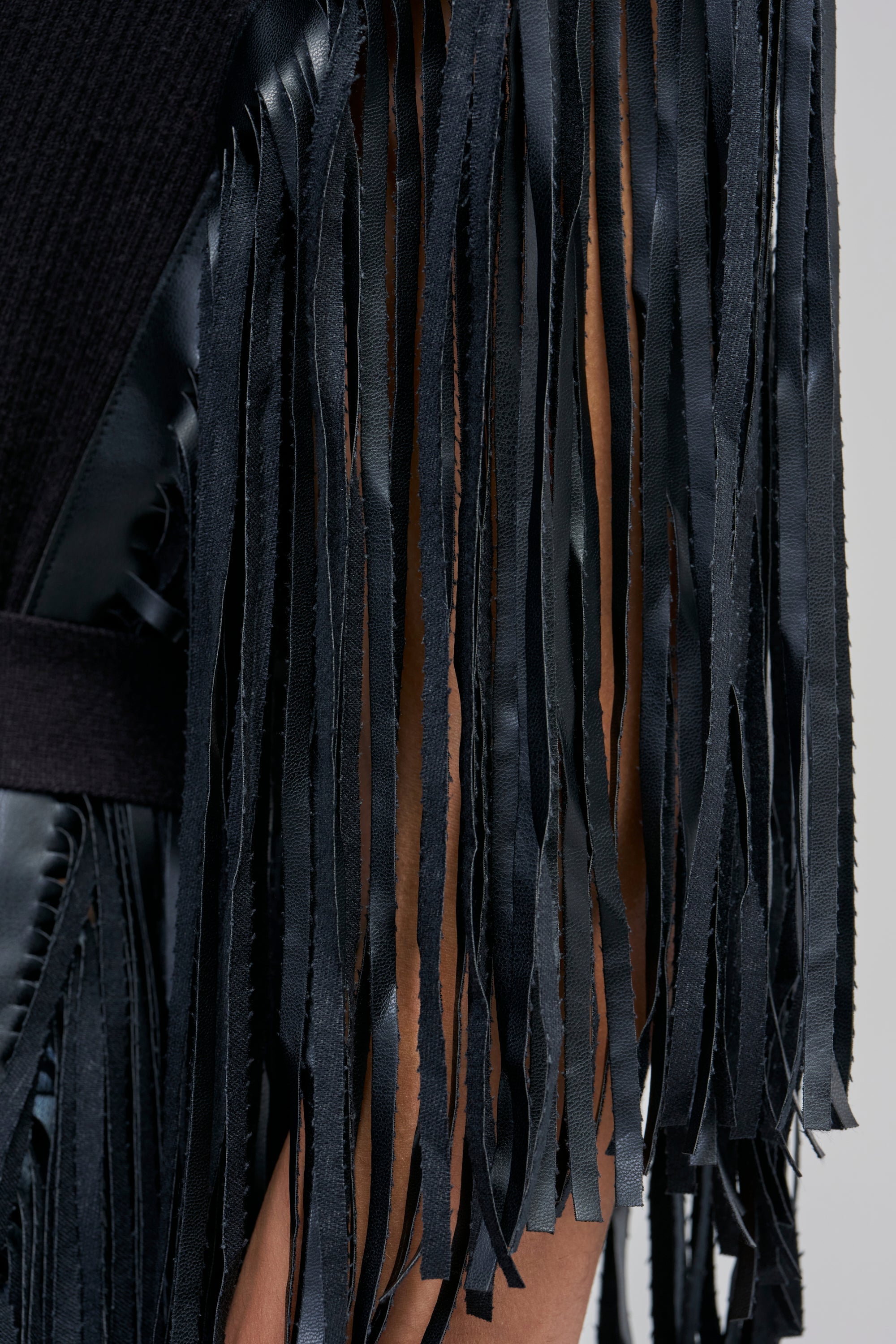 CHEYENNE FAUX BLACK LEATHER FRINGE BELTED SWEATER