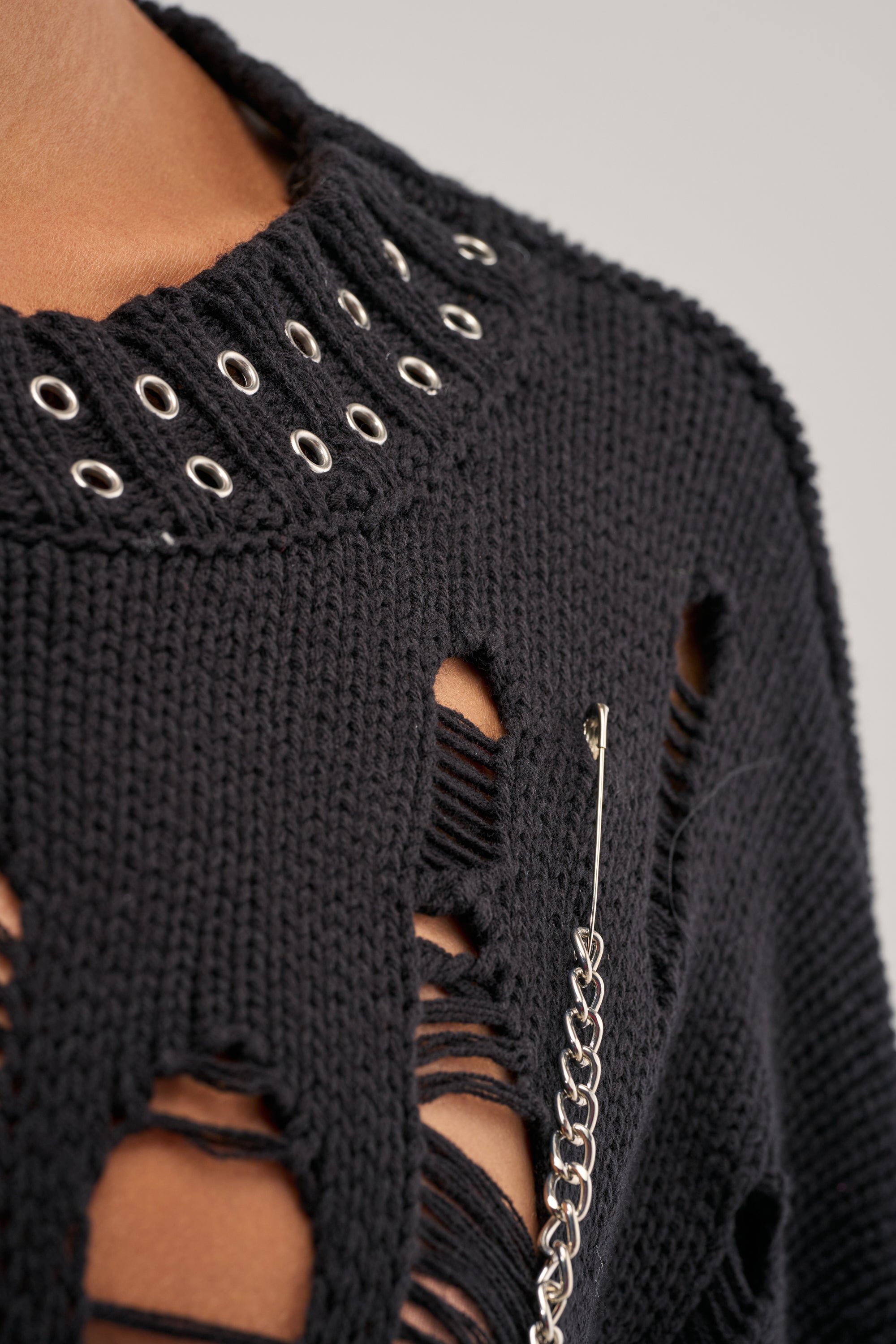 CHOPPED UP DISTRESSED SWEATER